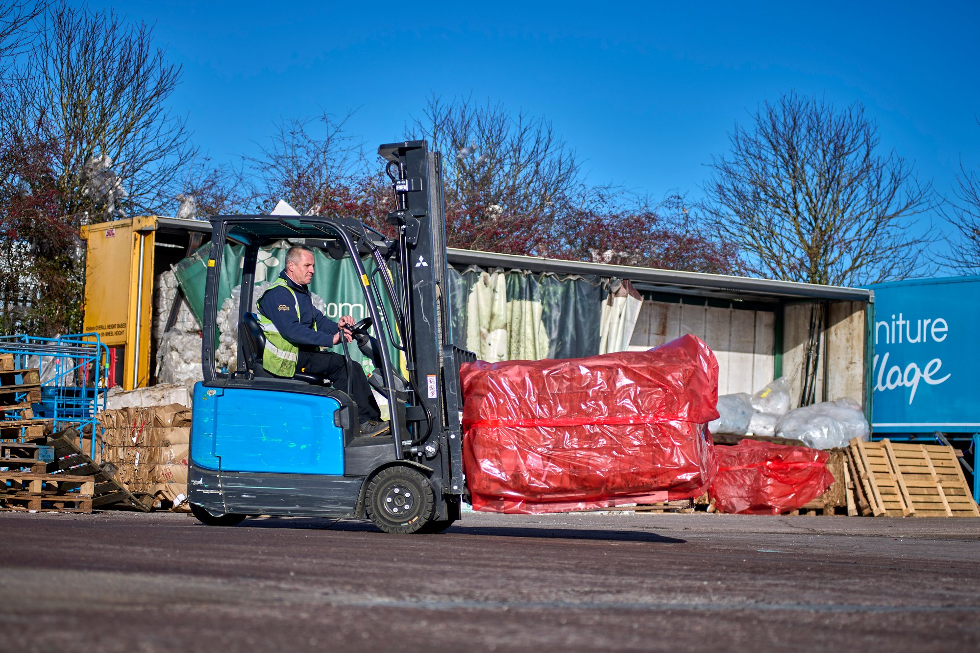 Electric counterbalance trucks for yard work and recycling